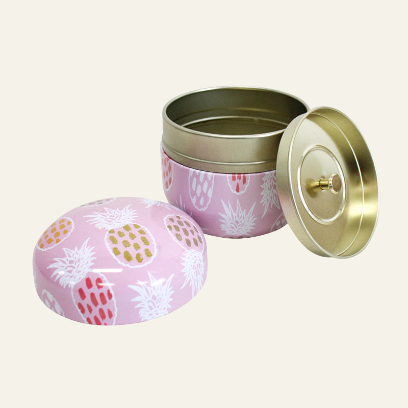 Pink pineapple trinket tin shown open with removable gold-tone lid.