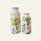 Two ceramic bug vases with lemon and leaf pattern 