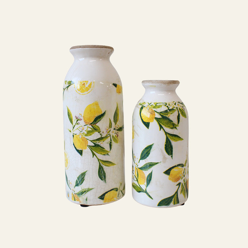 Two ceramic bug vases with lemon and leaf pattern 