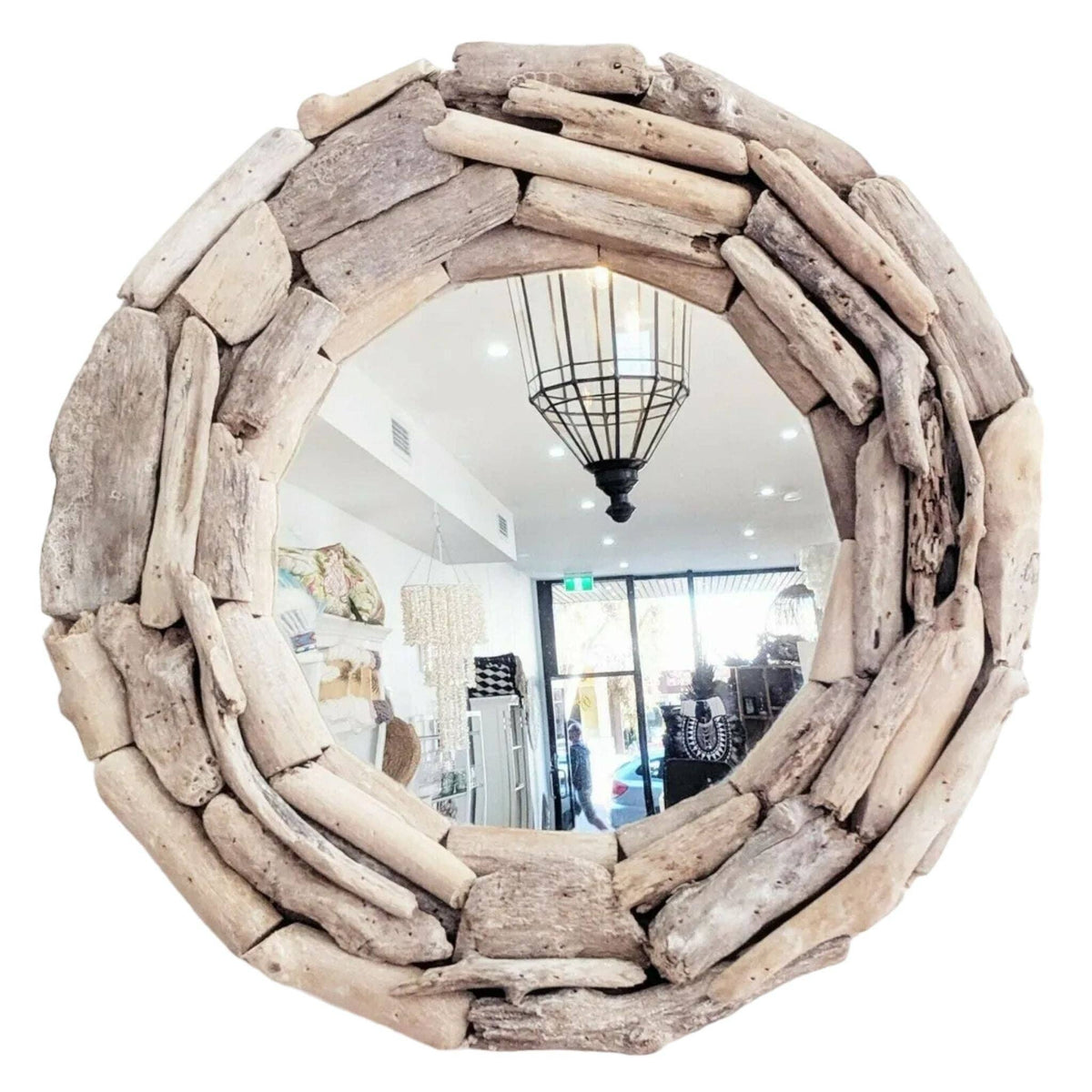 Round driftwood mirror with a rustic frame made of stacked natural wood logs, shown against a plain white background.