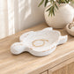 Top view of a rustic white turtle-shaped wooden bowl with a shallow centre and carved detailing.